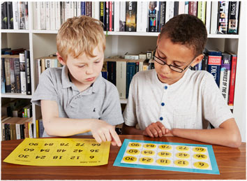 Children learning with the Multiplication Rules! activity pack